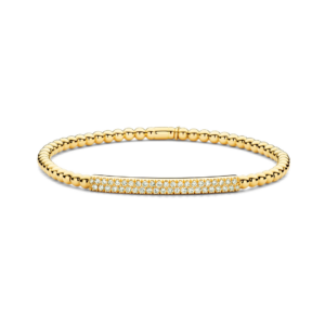 This 18kt yellow gold Hulchi Belluni Tresore Collection diamond stretch bracelet features 2 rows of round brilliant diamonds totaling 0.41ctw