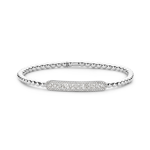 This 18kt white gold Hulchi Belluni Tresore stretch bracelet features 11 round diamonds in a diamond halo of 56 round brilliant diamonds totaling .92ctw.